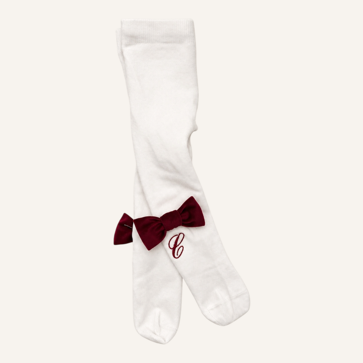 Collant in caldo cotone con fiocco in velluto bordeaux con iniziale ricamata