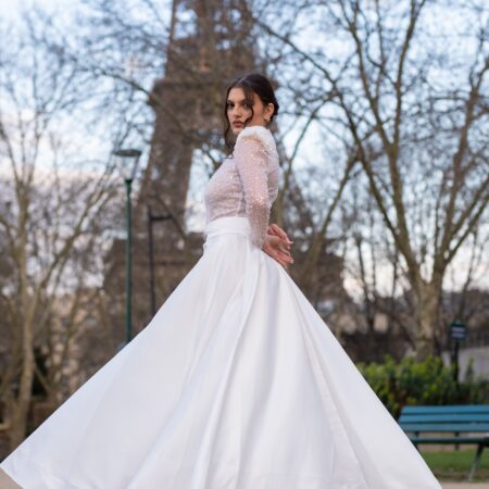 Abito manica lunga di perline con gonna rimovibile