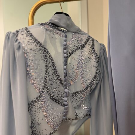 Blusa donna in perline sfumate polvere