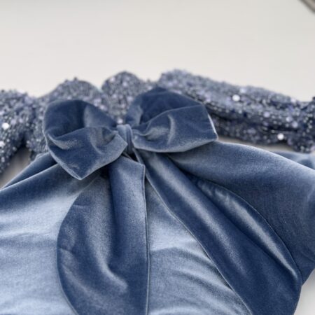 Abito corpino in perline e gonna in velvet